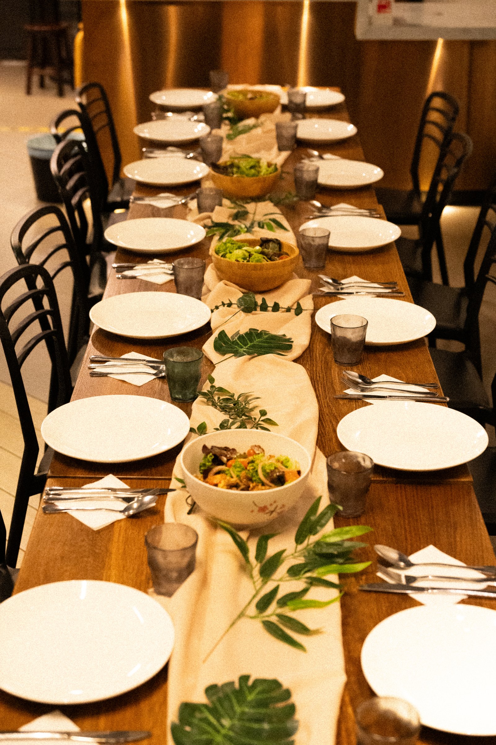 Beautiful table setting with greenery